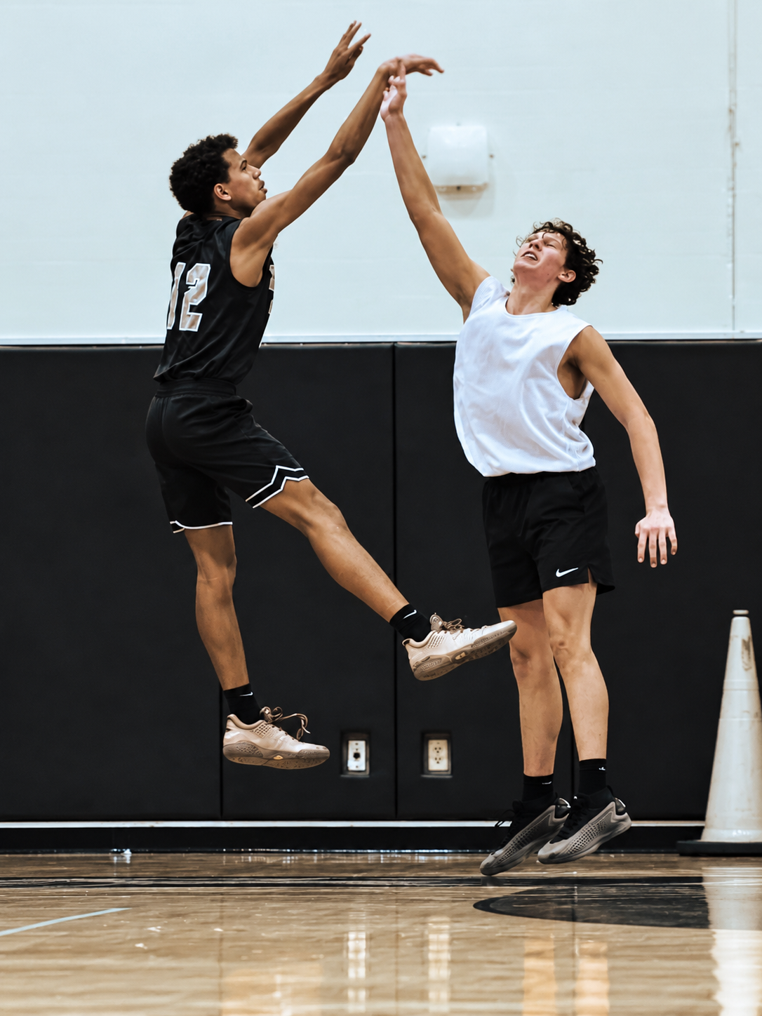 Aaron Garrard, number 12, elevating for a jump shot