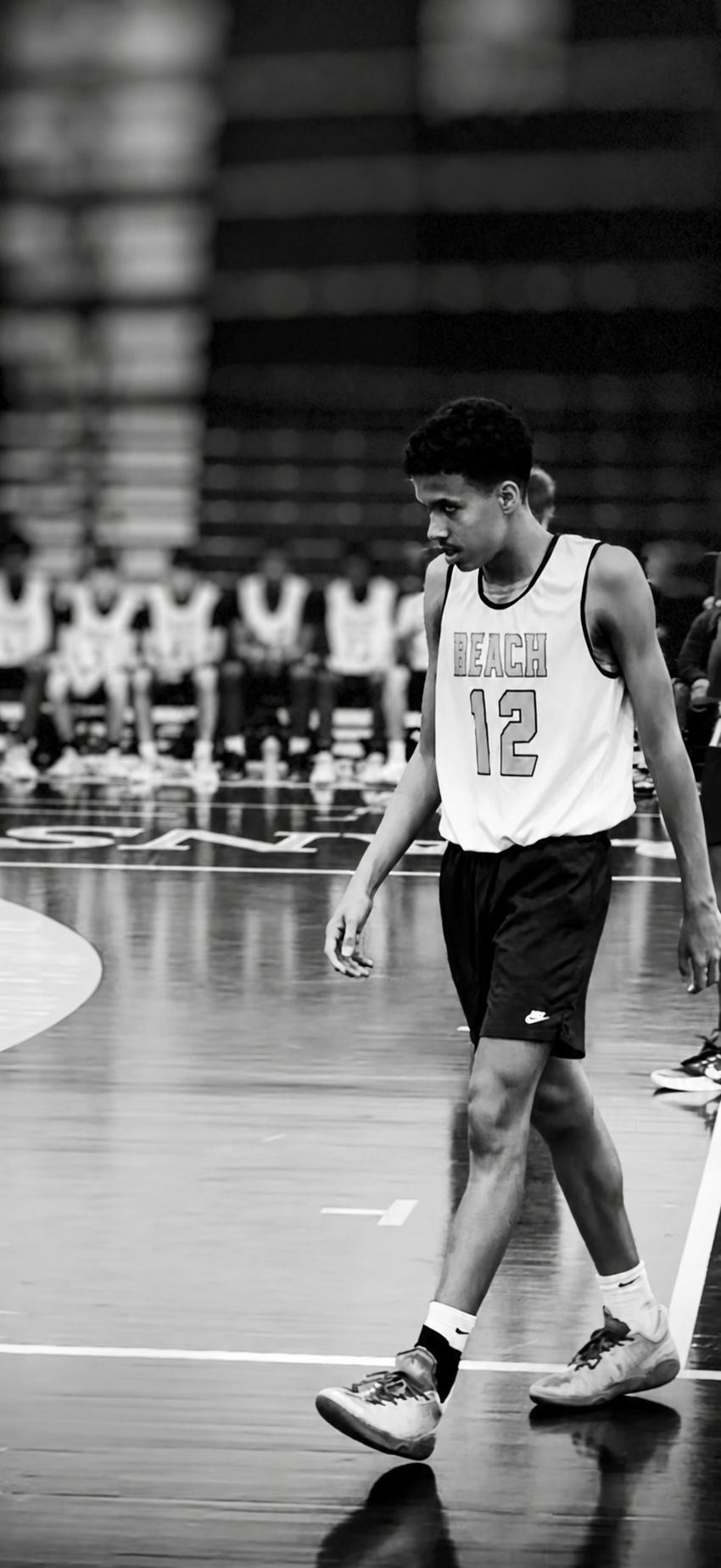 Aaron Garrard, number 12, on the court during his freshman season